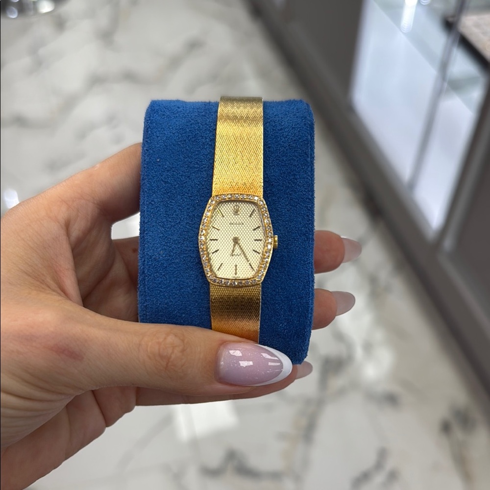 Elegant Rolex Gold Watch with Diamond Accents
